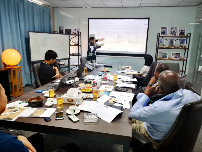 Technical meeting explaining chicken manure pellet production process flow for Zimbabwe fertilizer plant